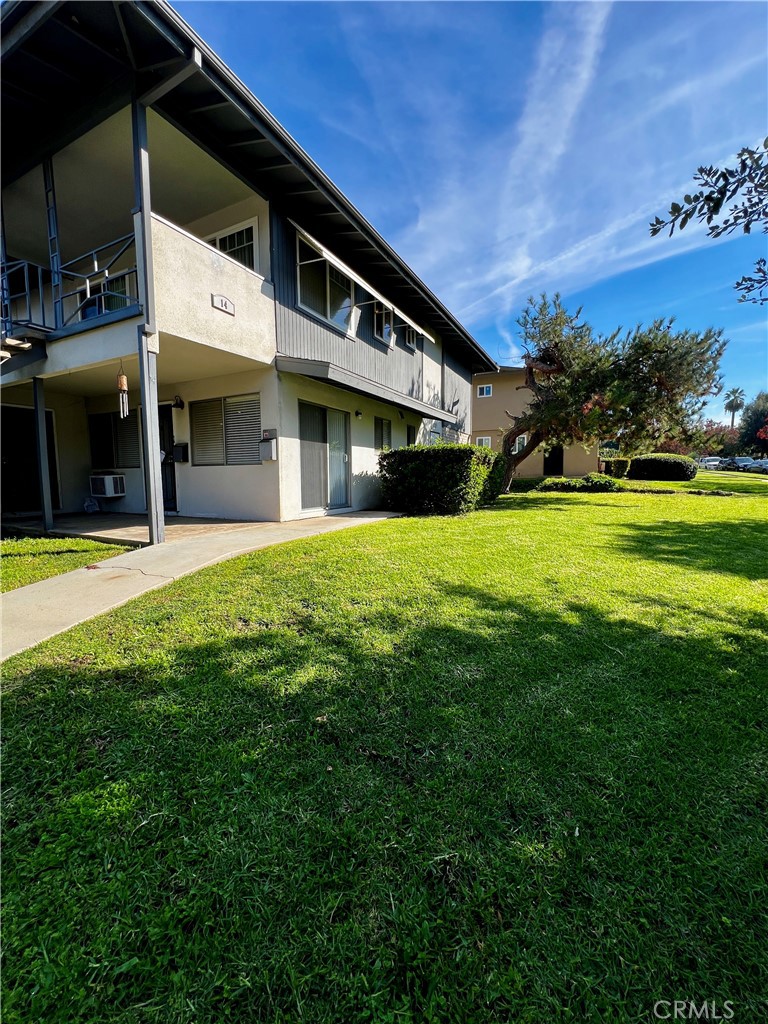 a view of a house with a big yard