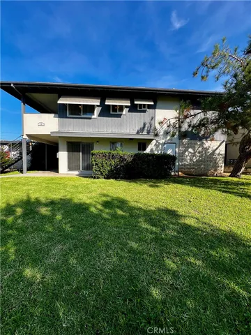 a view of building with yard