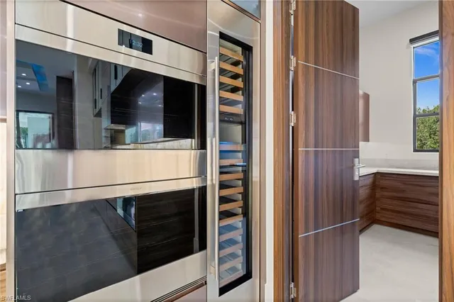 a view of front door and bedroom