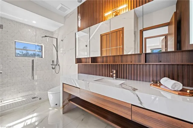 en empty room with fan and windows