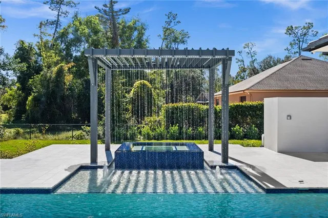 a view of a garden with a sitting area