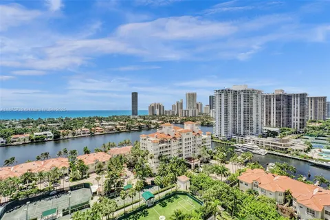 a view of a city with tall buildings