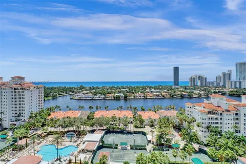 a view of a city with tall buildings