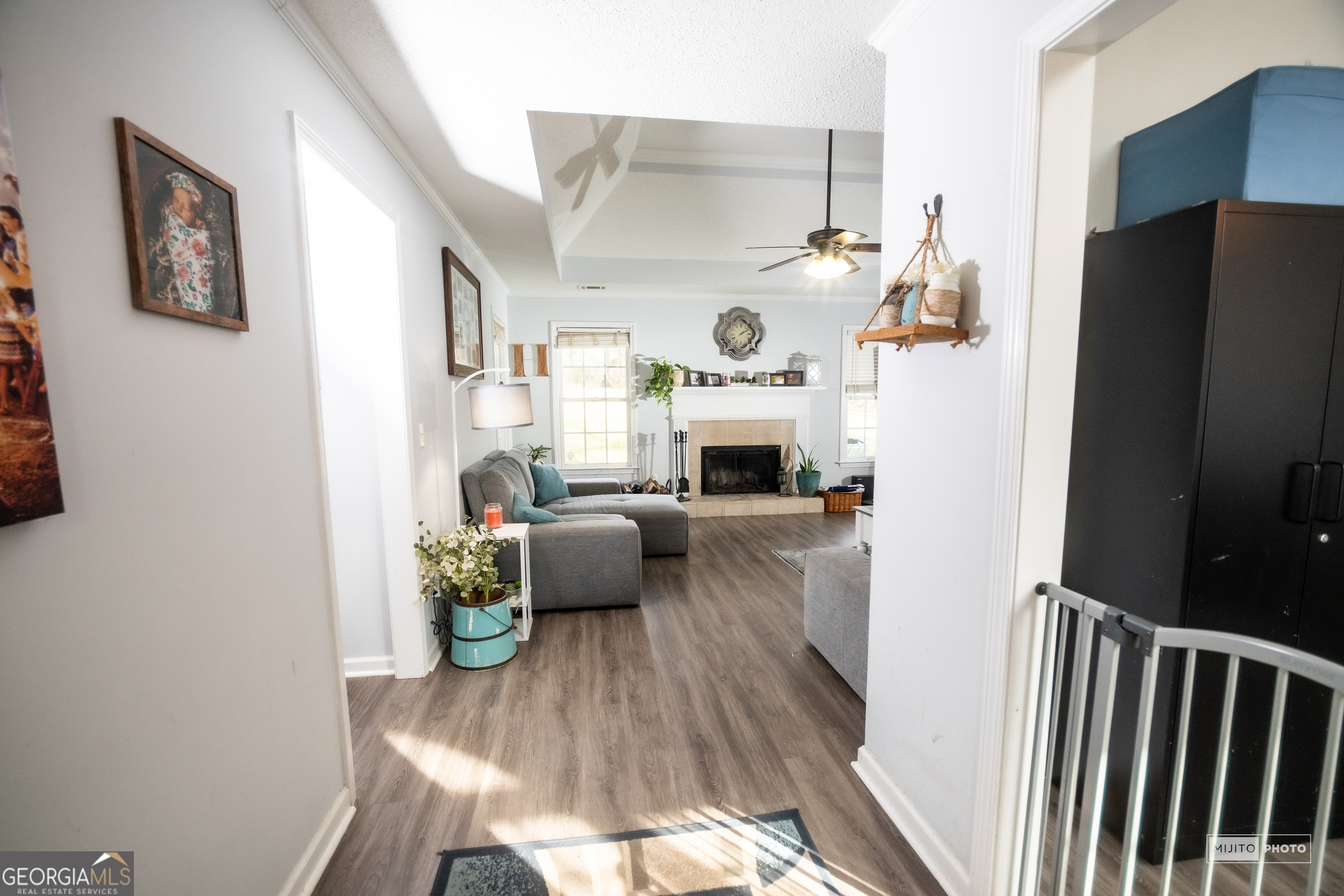 124 Austin Way Jefferson, GA 30549 - Photo 15 of 32 a living room with furniture and a fireplace