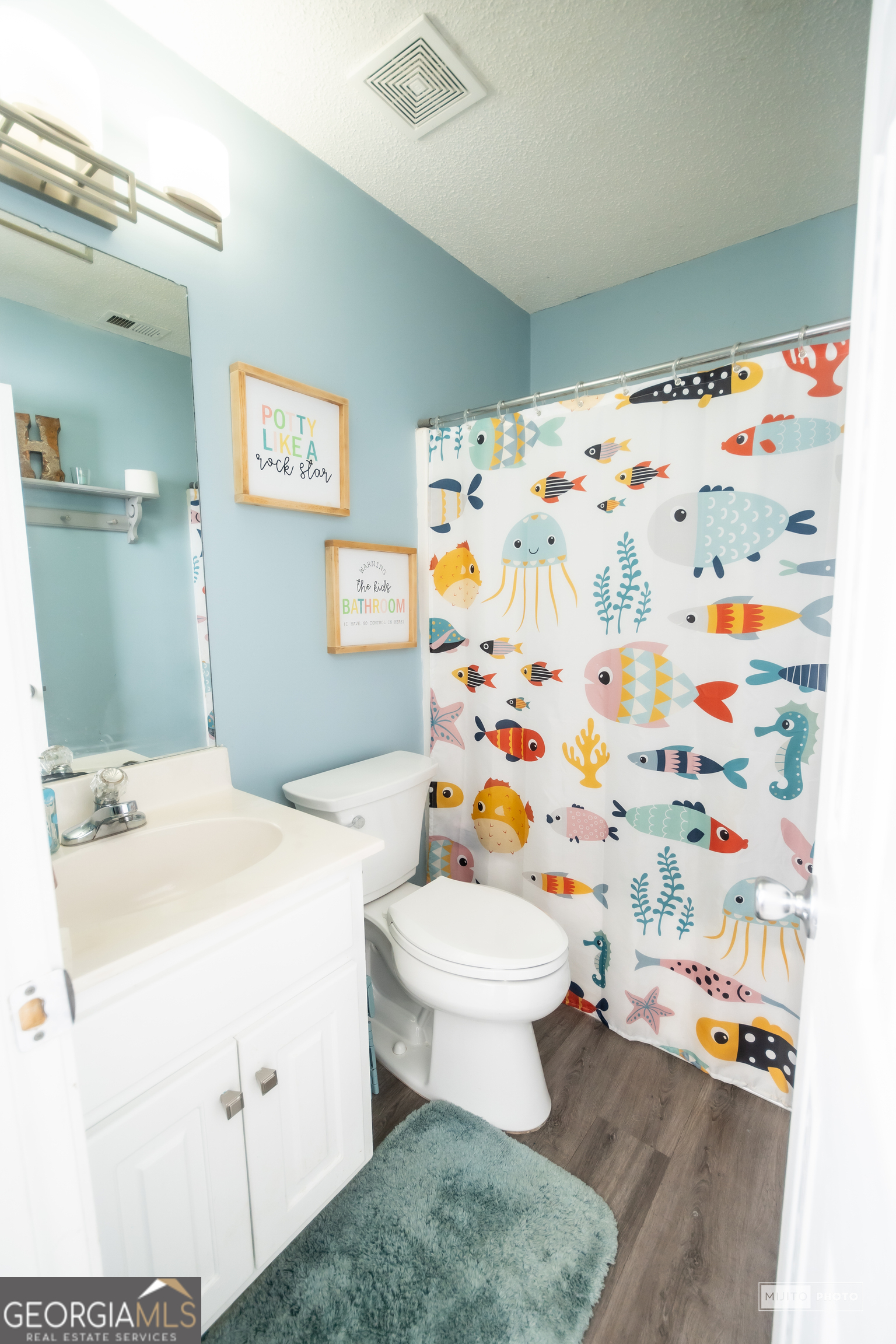 124 Austin Way Jefferson, GA 30549 - Photo 25 of 32 a bathroom with a sink toilet and shower