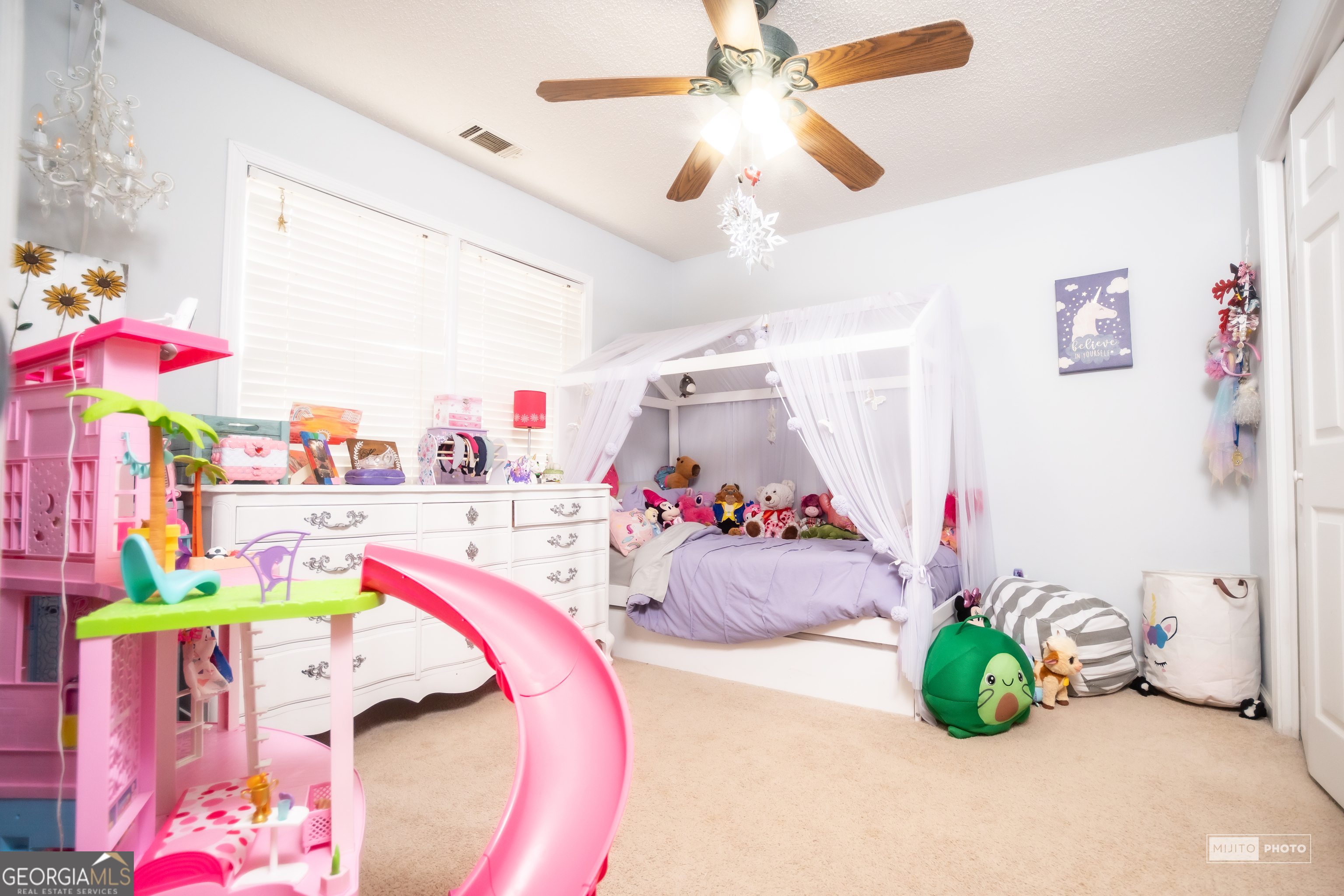 124 Austin Way Jefferson, GA 30549 - Photo 27 of 32 a room with toys and a chandelier