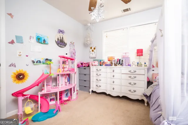 a bed room with a bed and a couch