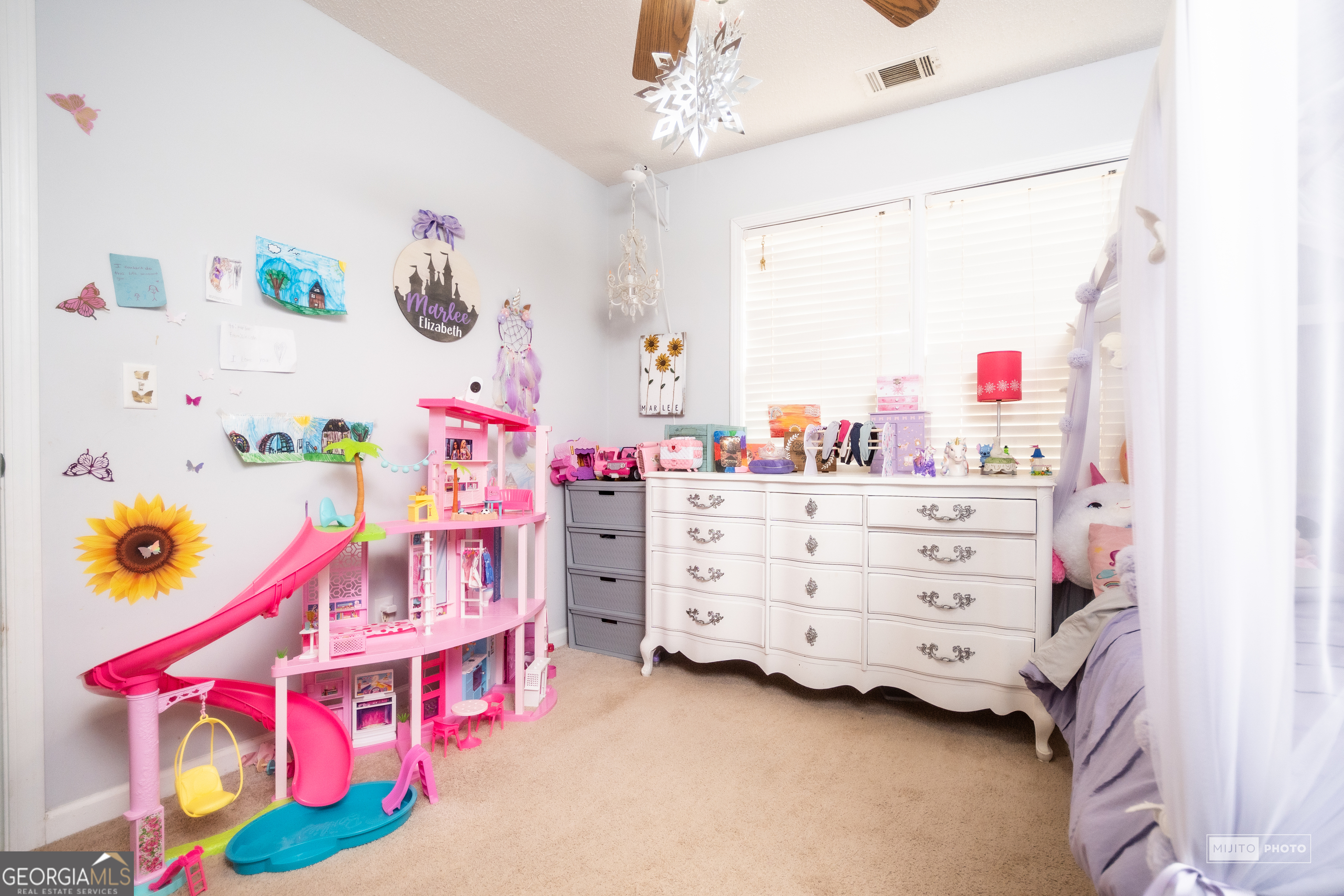 124 Austin Way Jefferson, GA 30549 - Photo 28 of 32 a bedroom with furniture and a baby bed