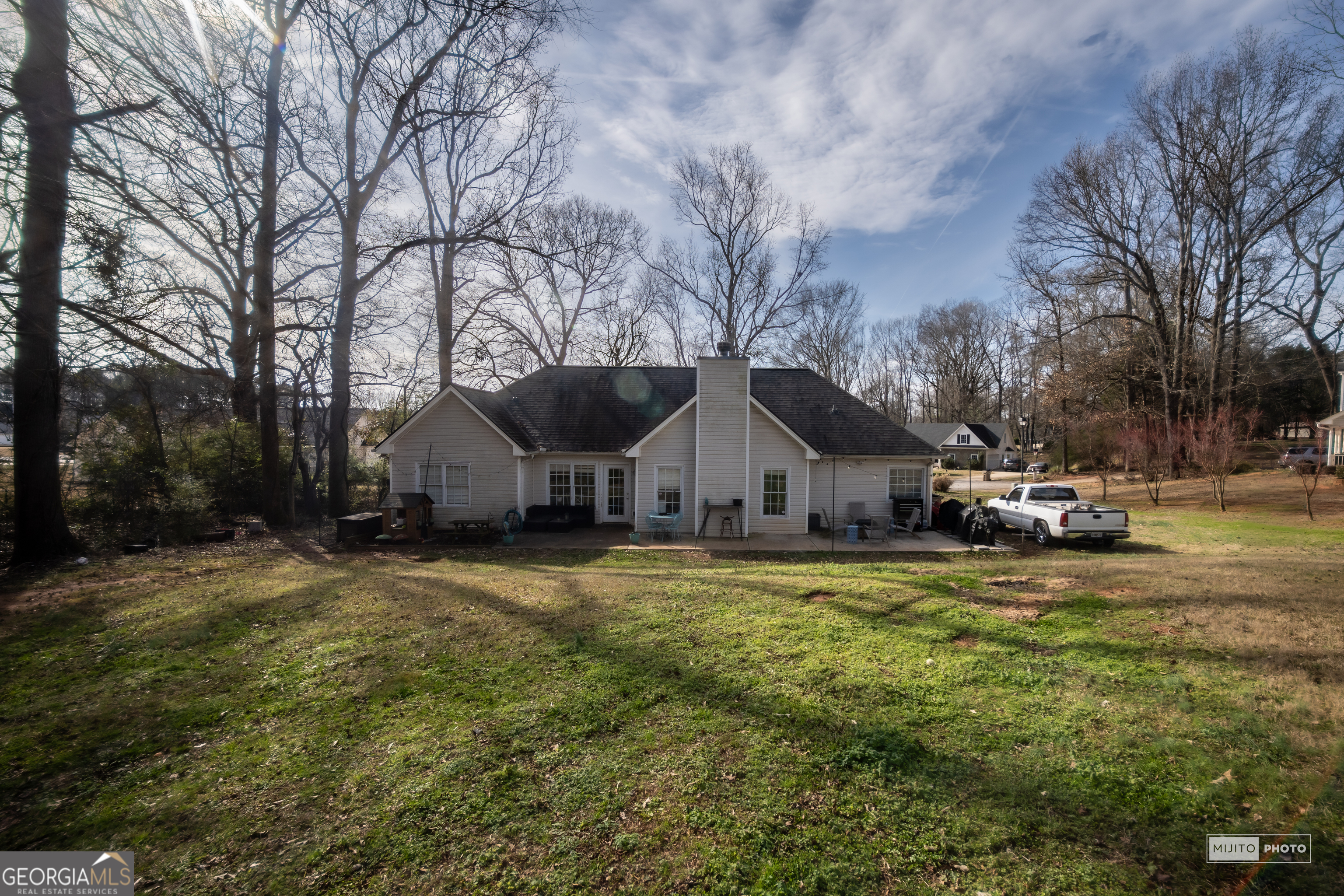 124 Austin Way Jefferson, GA 30549 - Photo 32 of 32 a front view of a house with a yard and garage