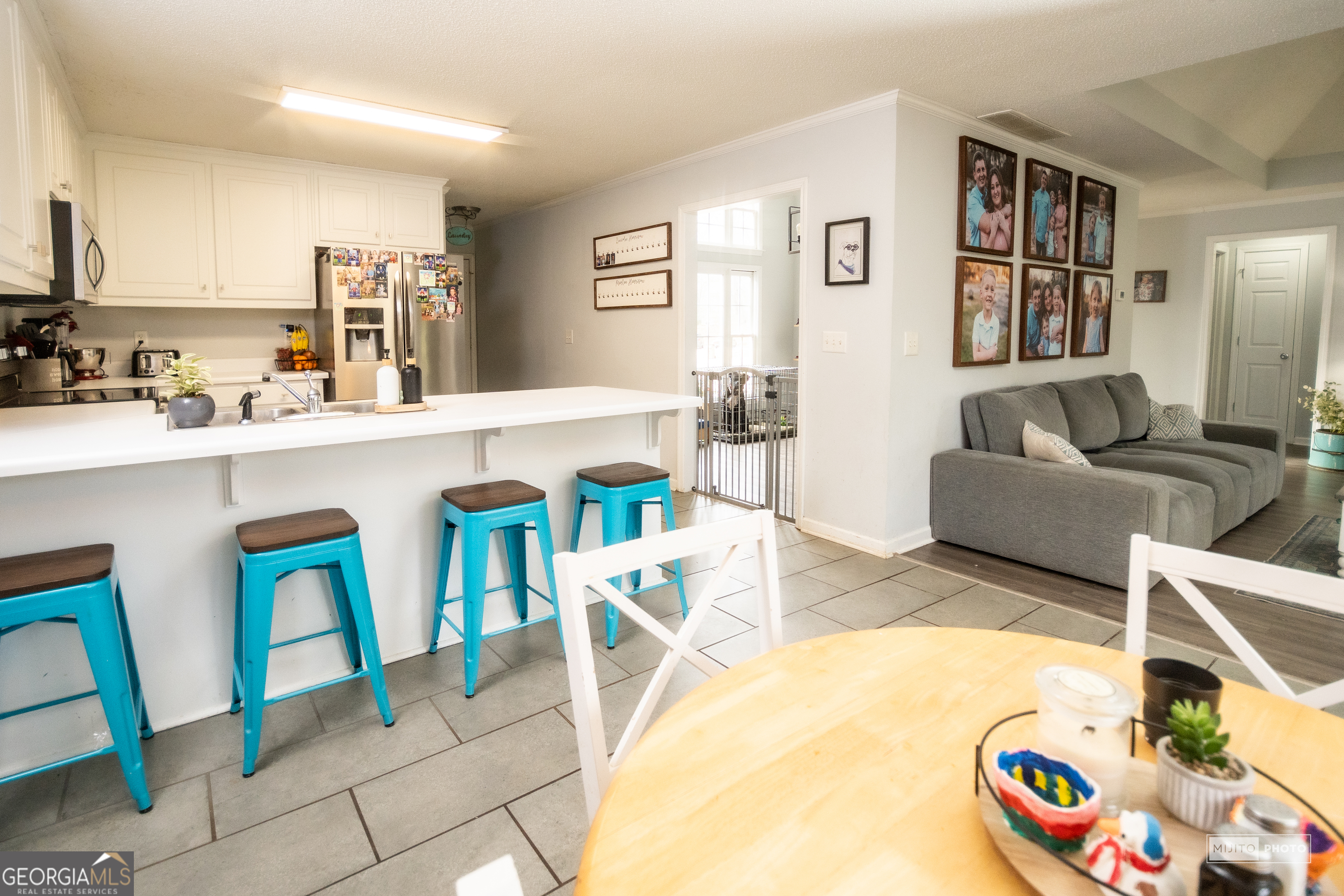 124 Austin Way Jefferson, GA 30549 - Photo 10 of 32 a living room with furniture and a table