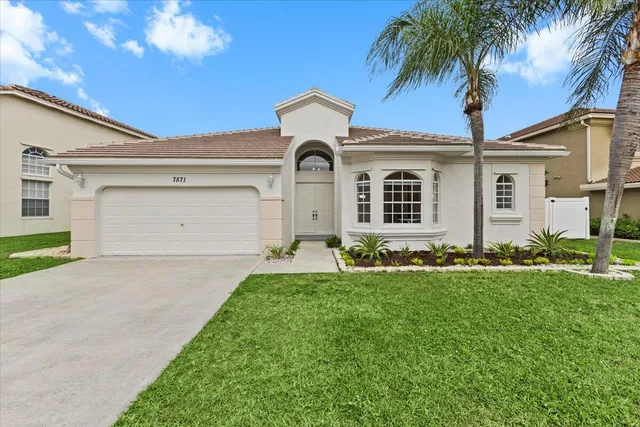 $699,000 | 7571 Greenville Circle, Lake Worth, FL 33467