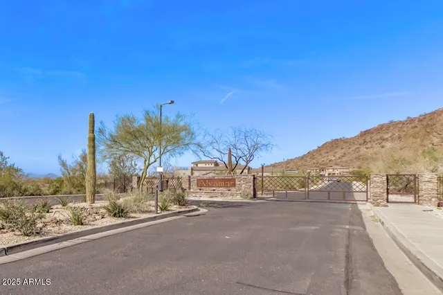 a view of a road with a building in the background
