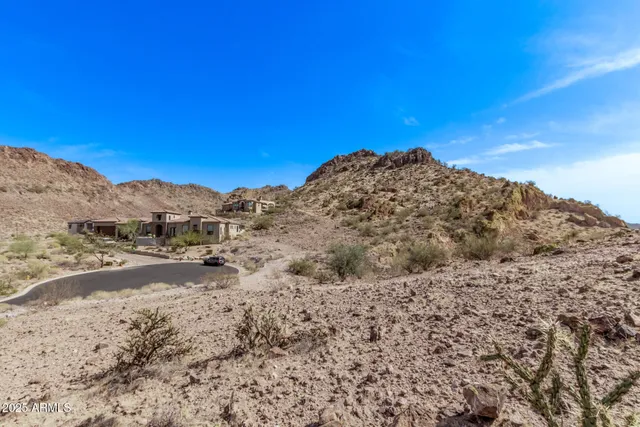 a view of a mountain view with mountains in the background