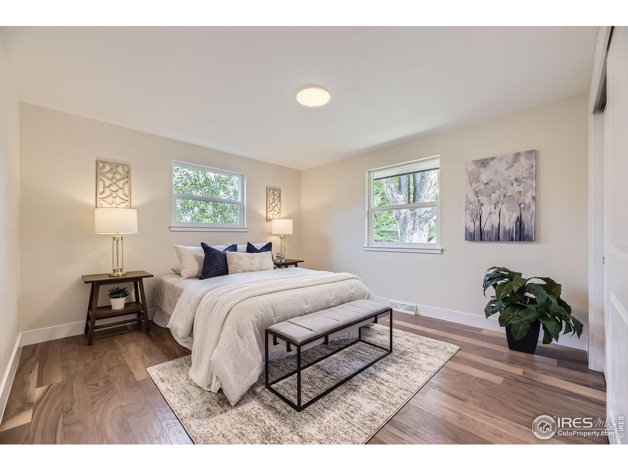 1505 Findlay Way Boulder, CO 80305 - Photo 12 of 31 a bedroom with a bed window and a table