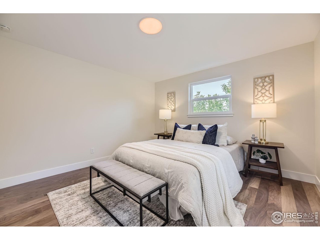 1505 Findlay Way Boulder, CO 80305 - Photo 14 of 31 a bed room with a bed window and a table