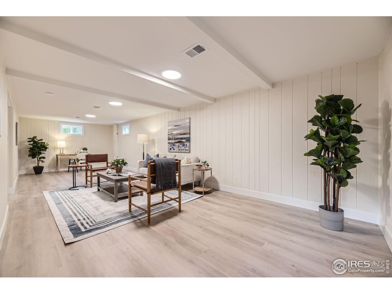 1505 Findlay Way Boulder, CO 80305 - Photo 18 of 31 a living room with furniture and a potted plant
