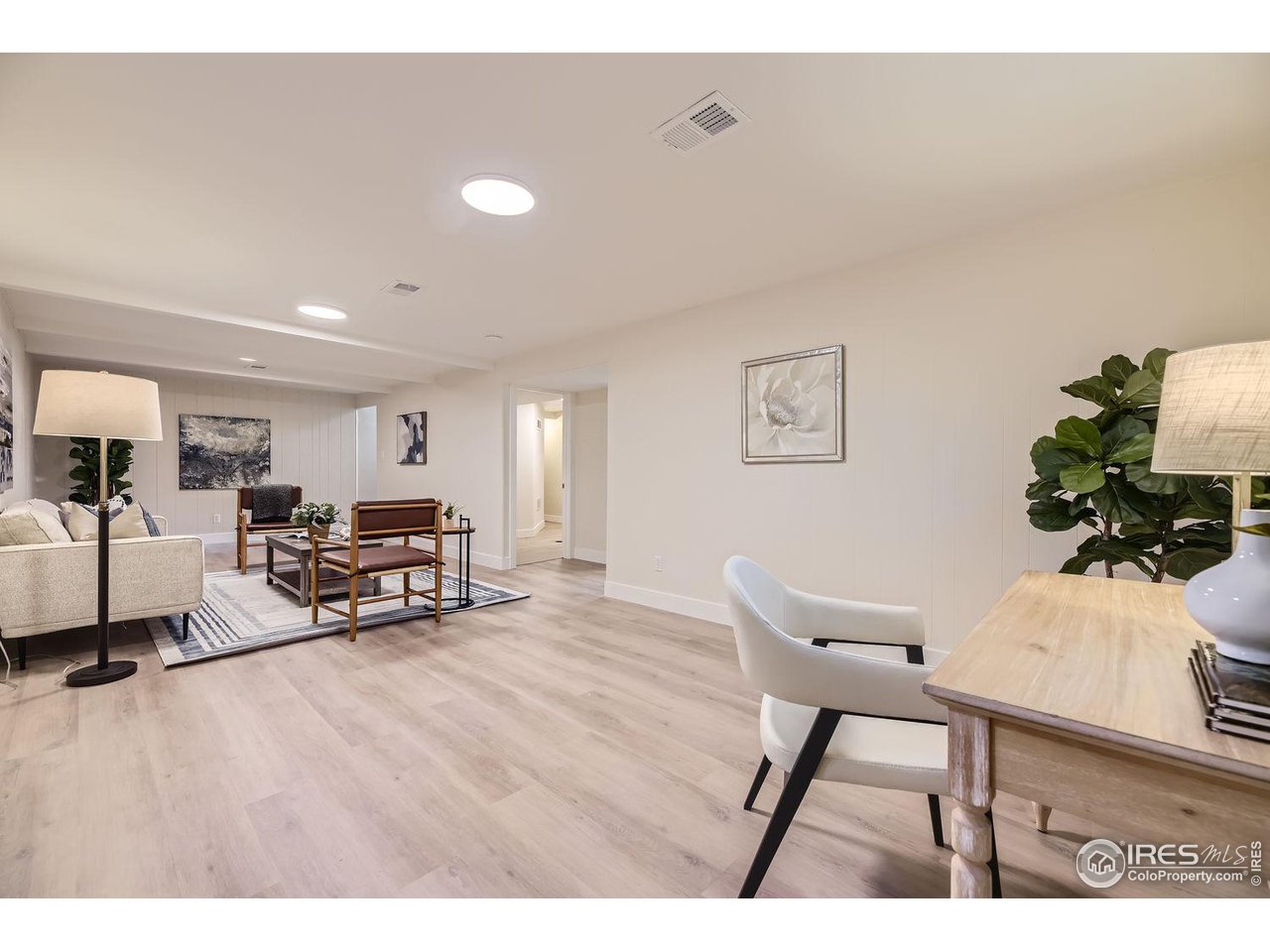 1505 Findlay Way Boulder, CO 80305 - Photo 20 of 31 a living room with furniture and a wooden floor