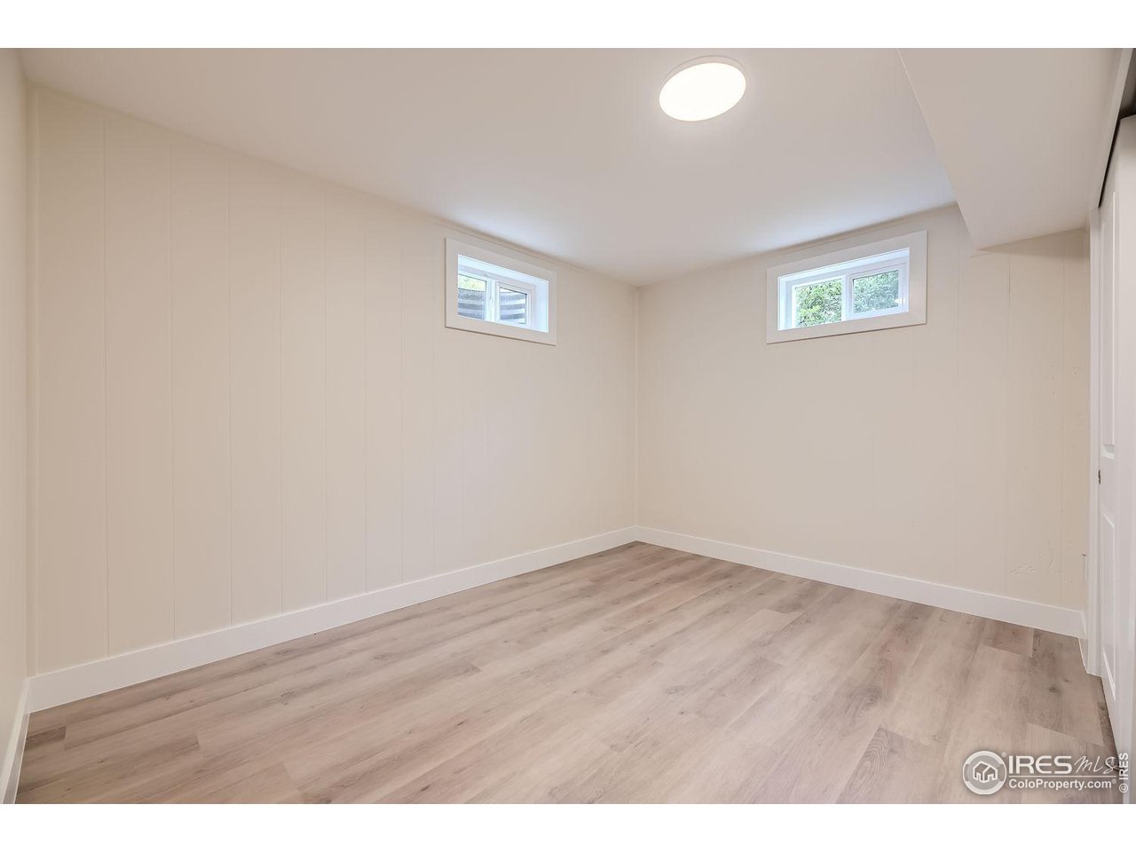 1505 Findlay Way Boulder, CO 80305 - Photo 21 of 31 a view of an empty room with a window