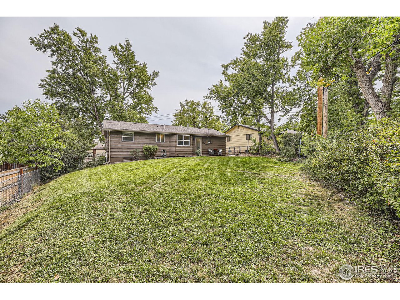 1505 Findlay Way Boulder, CO 80305 - Photo 27 of 31 a view of house with backyard and trees