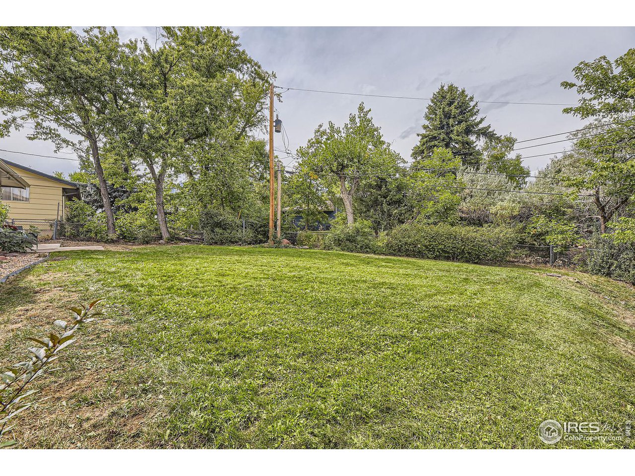 1505 Findlay Way Boulder, CO 80305 - Photo 28 of 31 a view of a yard with a house