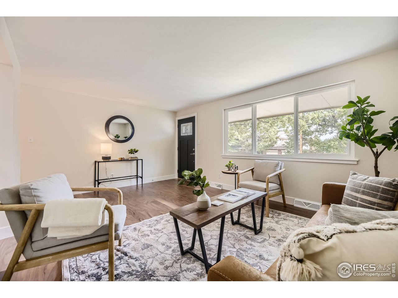 1505 Findlay Way Boulder, CO 80305 - Photo 6 of 31 a living room with furniture and a large window