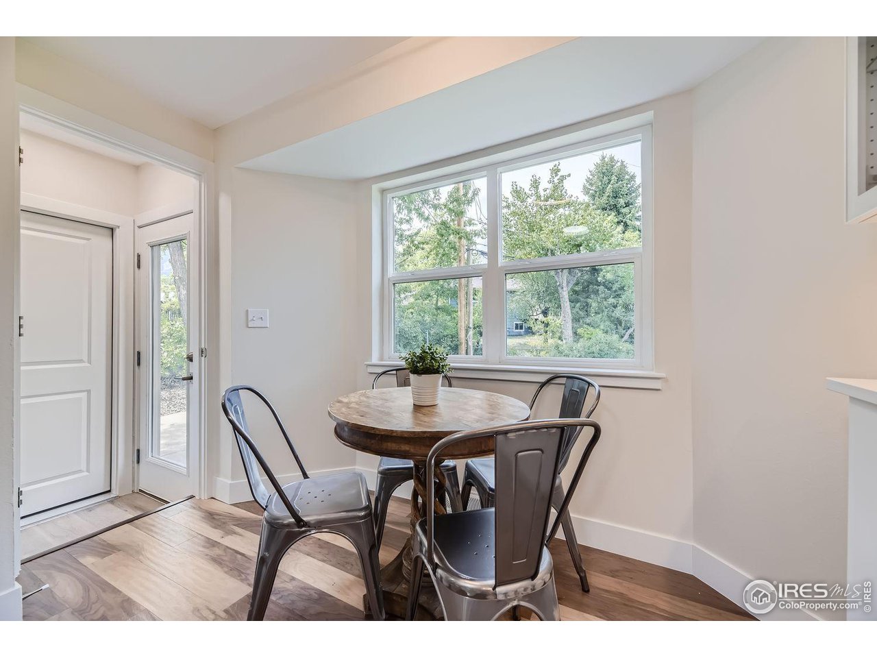 1505 Findlay Way Boulder, CO 80305 - Photo 7 of 31 a dining room with furniture and window