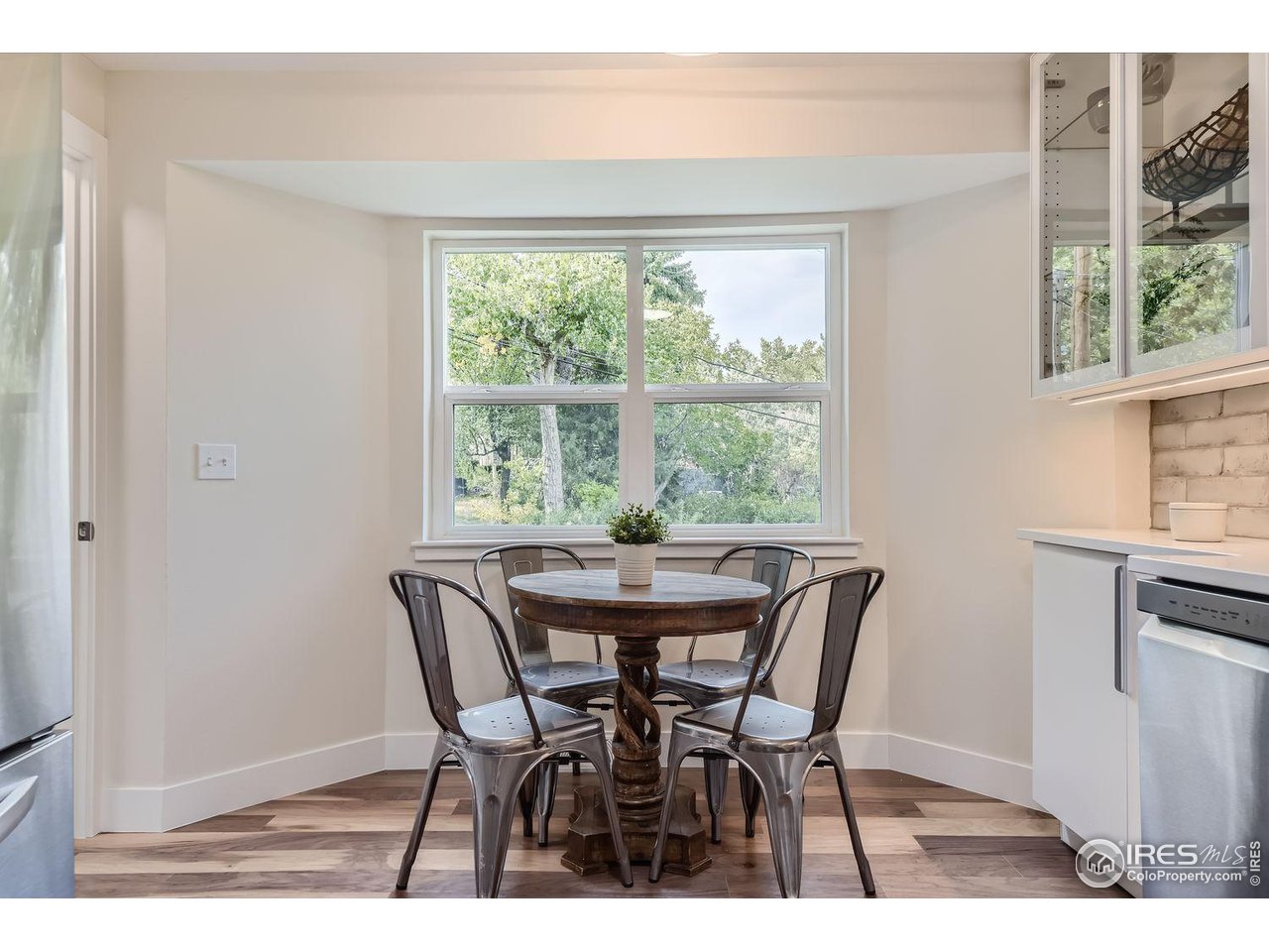 1505 Findlay Way Boulder, CO 80305 - Photo 8 of 31 a view of a dining room with furniture window and outside view