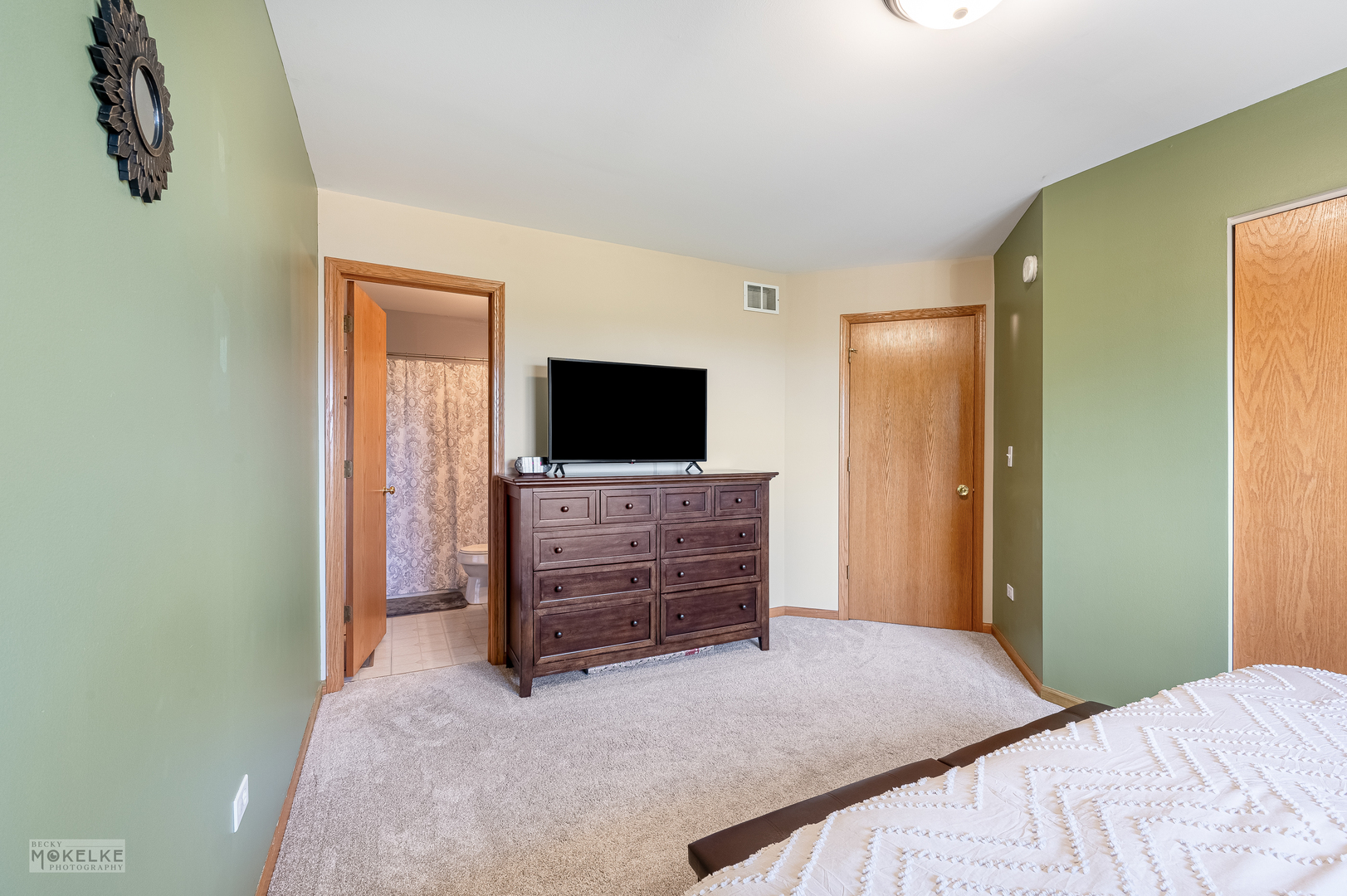 264 South Alder Creek Drive Romeoville, IL 60446 - Photo 12 of 26 a bedroom with a bed and flat screen tv