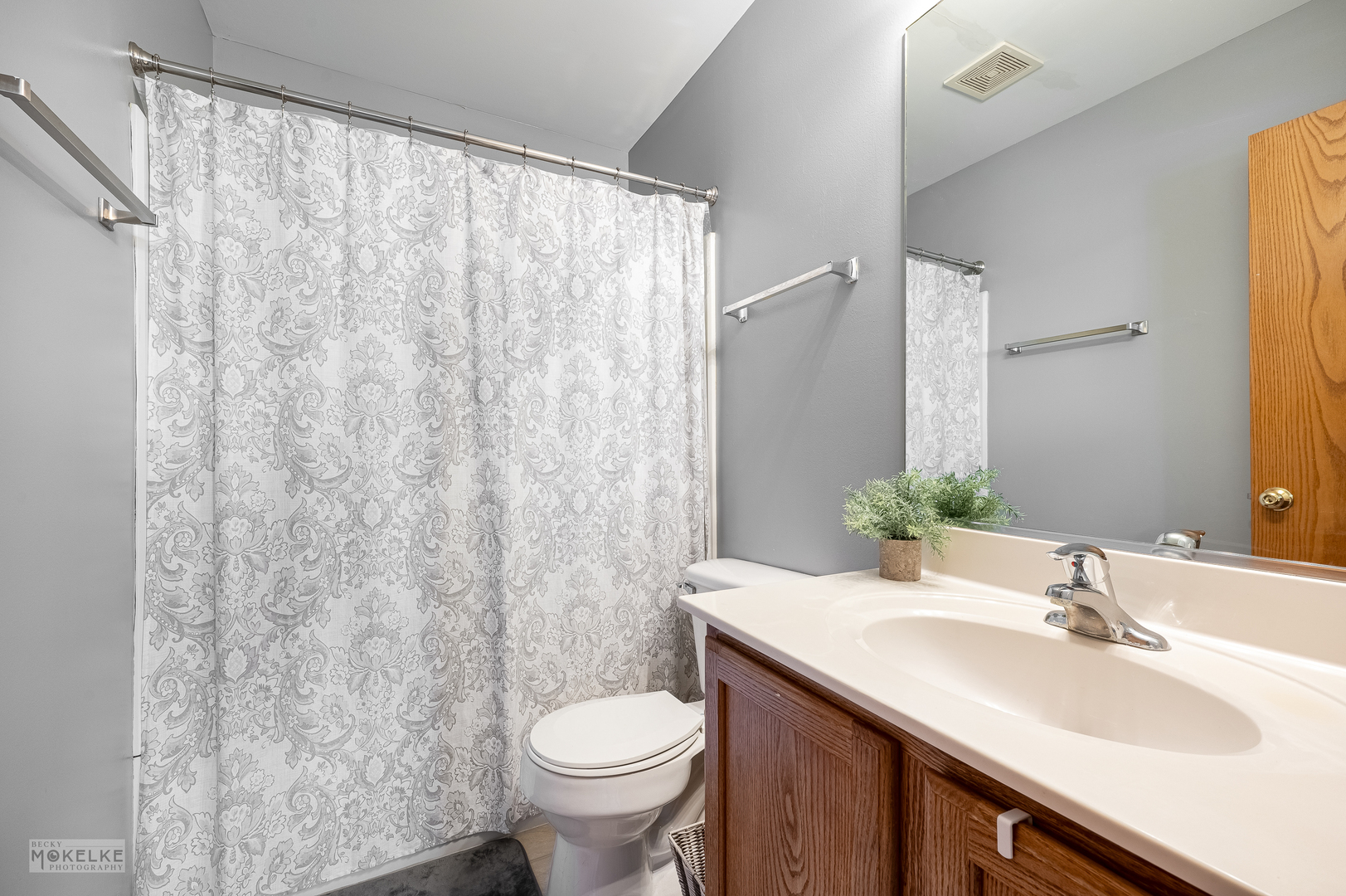 264 South Alder Creek Drive Romeoville, IL 60446 - Photo 13 of 26 a bathroom with a granite countertop sink and a mirror