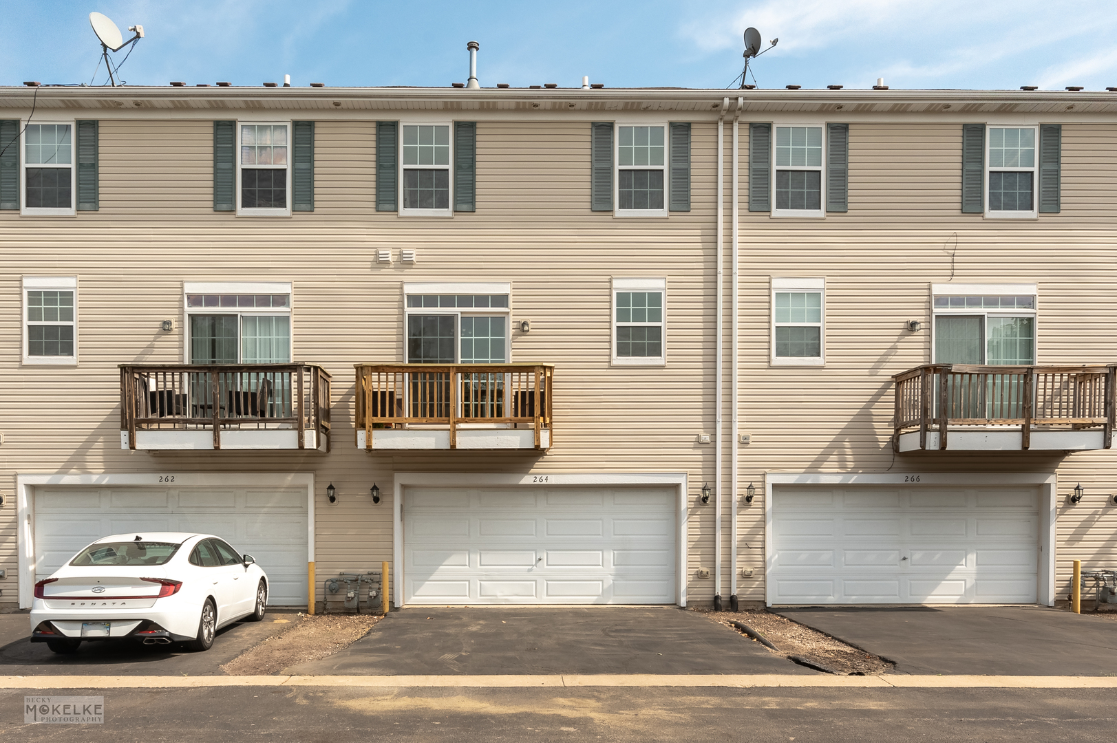 264 South Alder Creek Drive Romeoville, IL 60446 - Photo 21 of 26 a view of a car parked in front of a building