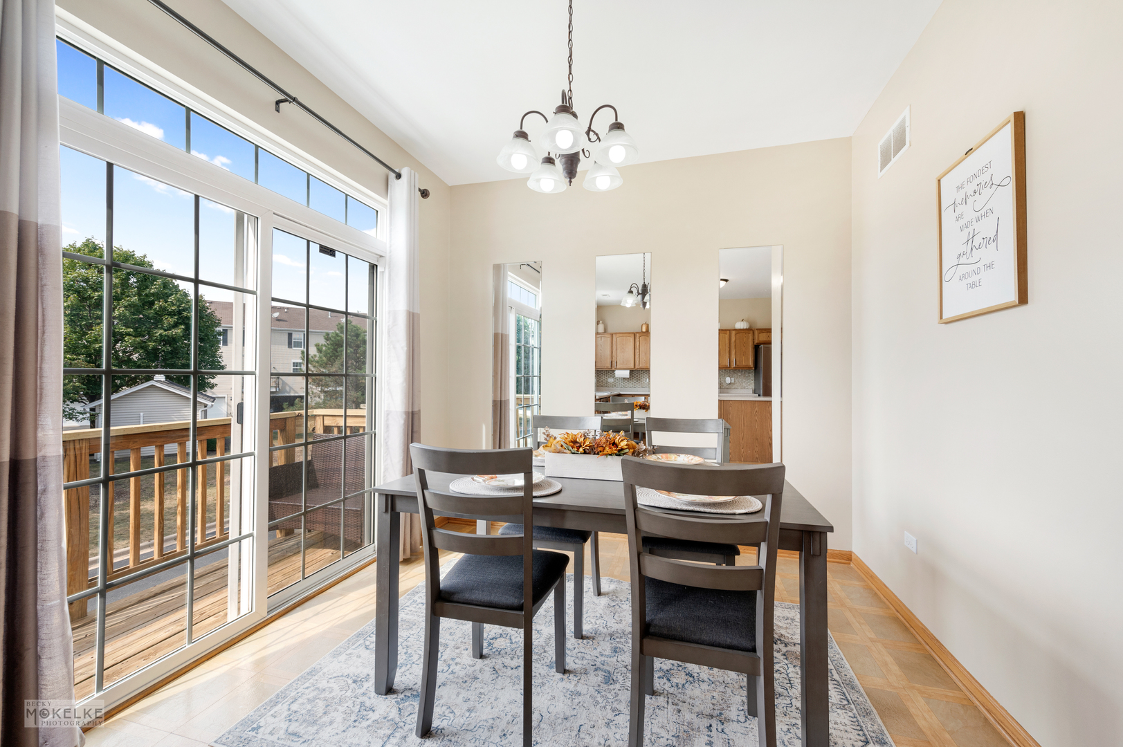 264 South Alder Creek Drive Romeoville, IL 60446 - Photo 5 of 26 a view of a dining room with furniture and a floor to ceiling window