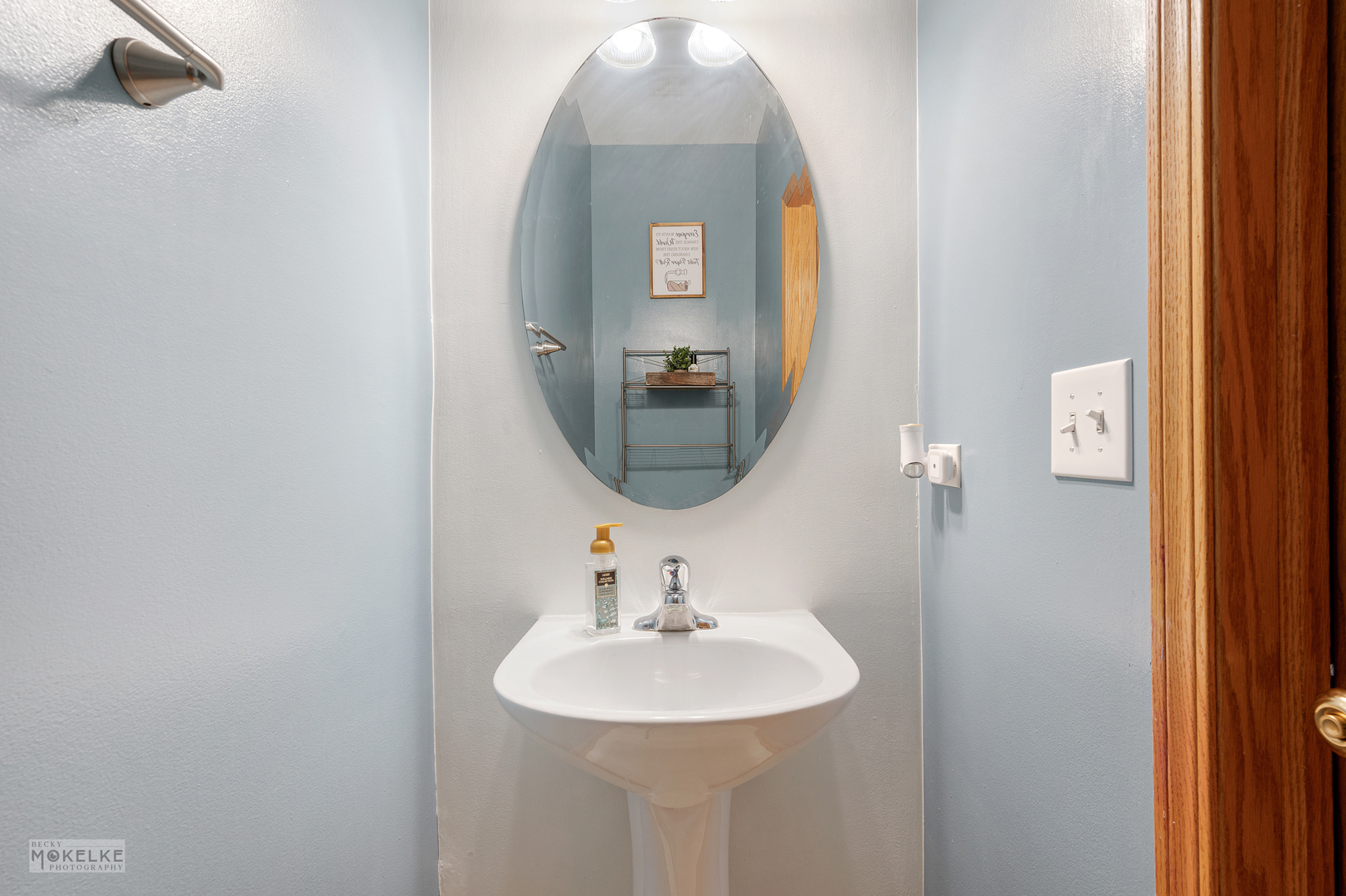 264 South Alder Creek Drive Romeoville, IL 60446 - Photo 10 of 26 a bathroom with a sink and a mirror