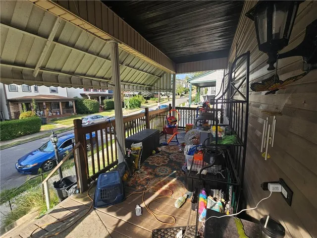 a view of a chairs and table in the patio