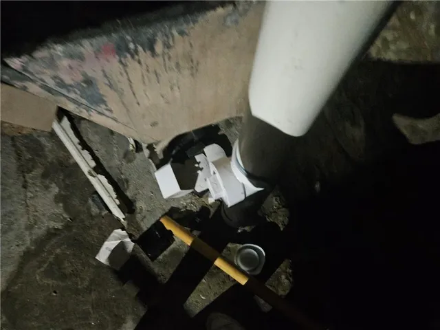 an aerial view of a fireplace with wooden floor