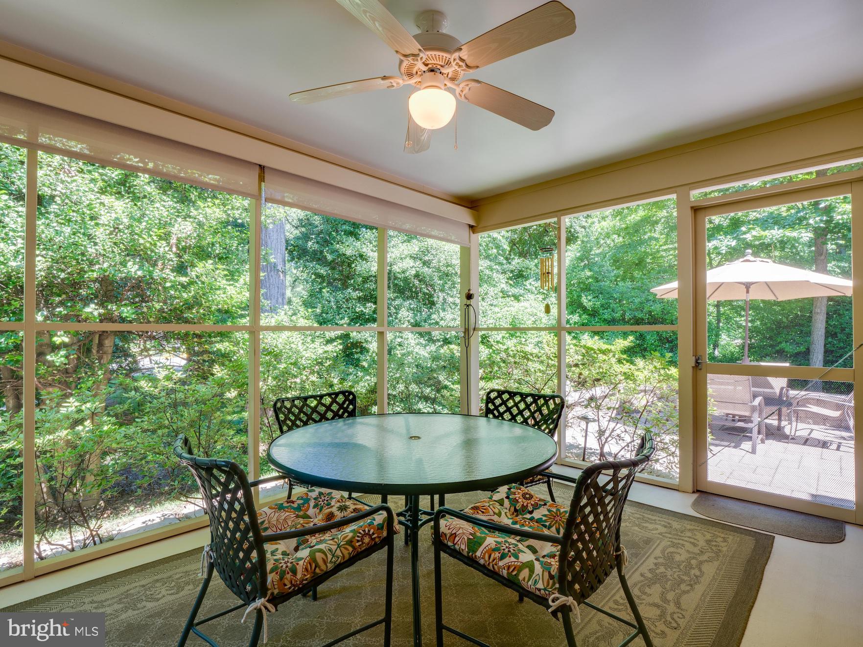 1407 Belcastle Court Reston, VA 20194 - Photo 16 of 42 Large screened porch with shades + ceiling fan