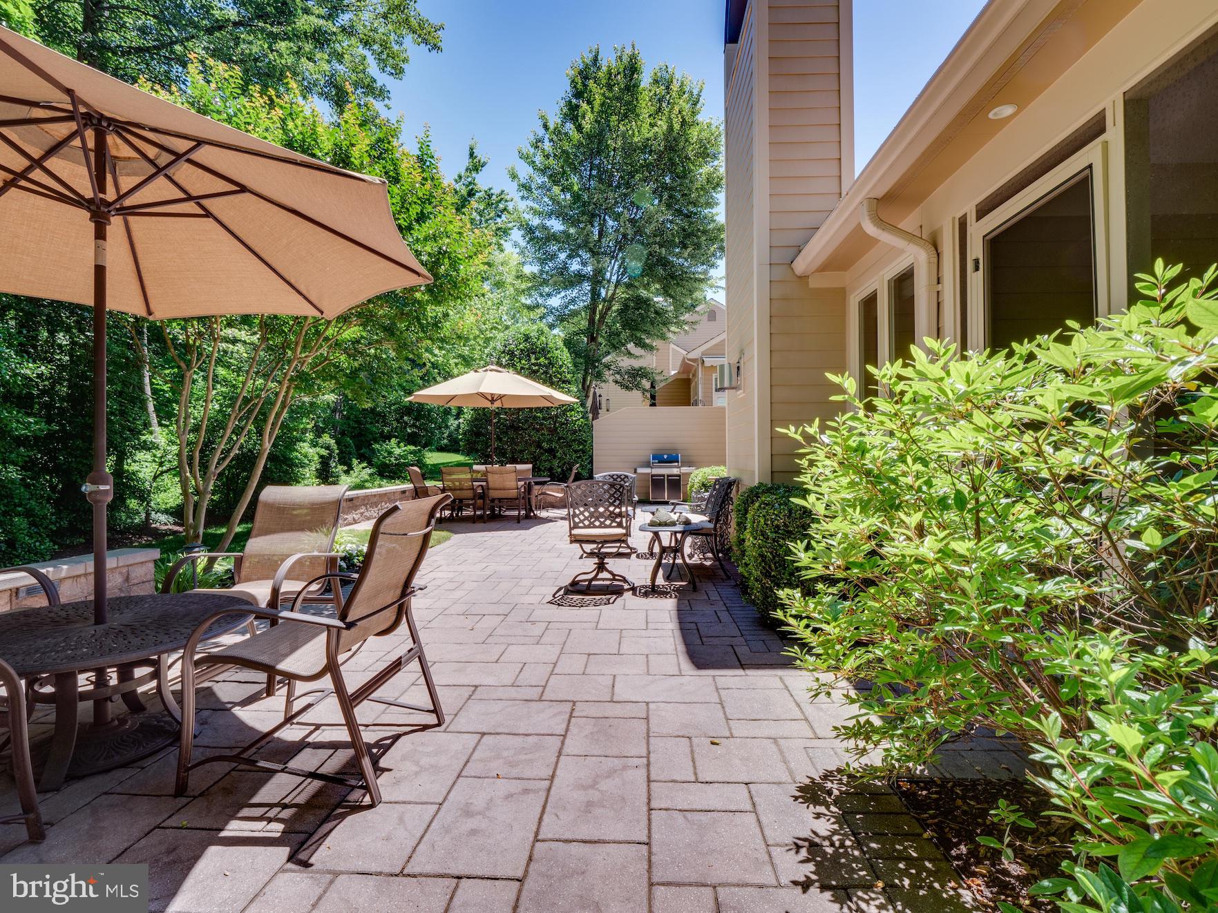 1407 Belcastle Court Reston, VA 20194 - Photo 17 of 42 Rear patio with knee wall spans width of home