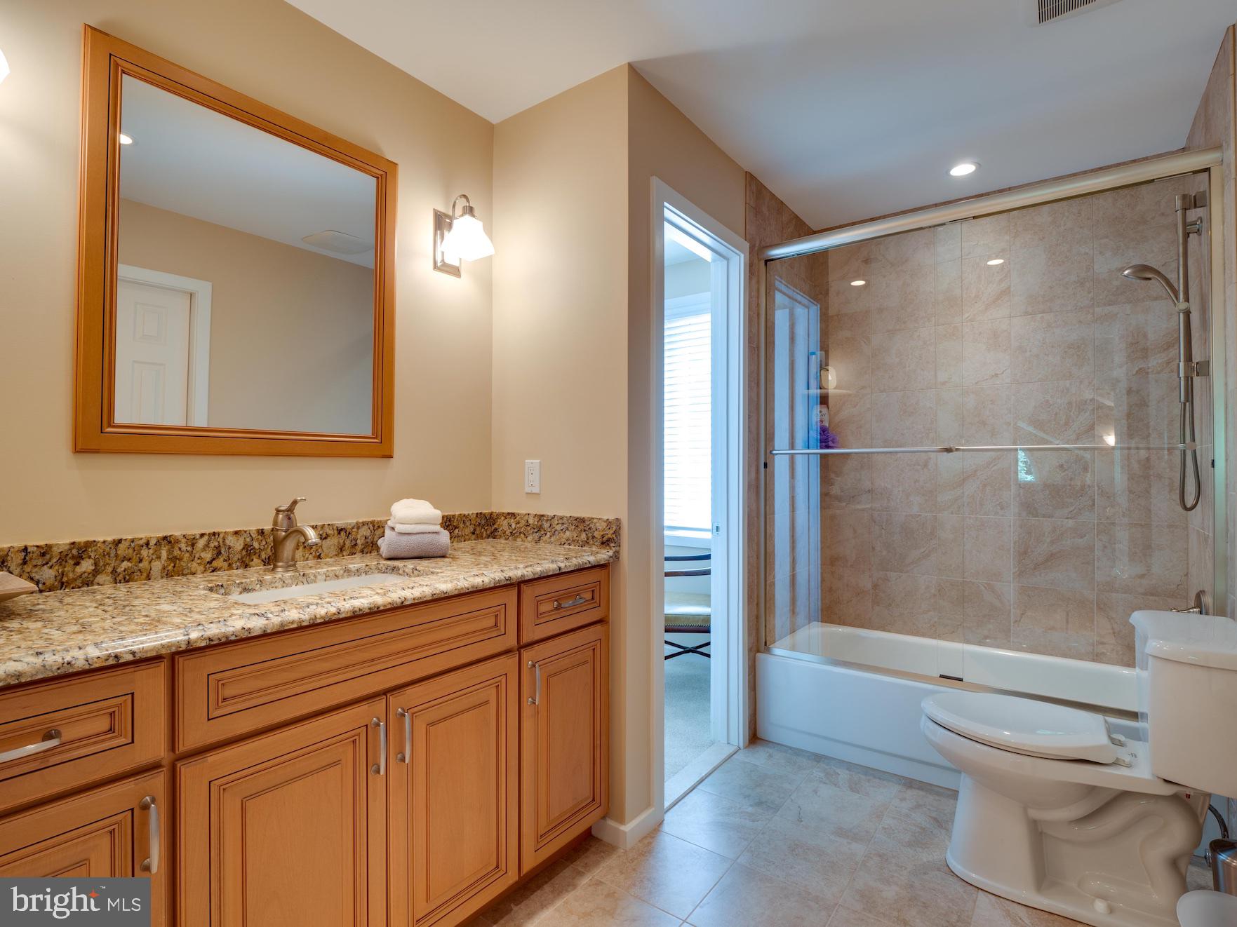 1407 Belcastle Court Reston, VA 20194 - Photo 32 of 42 Upper Level full bath with granite + glass shower
