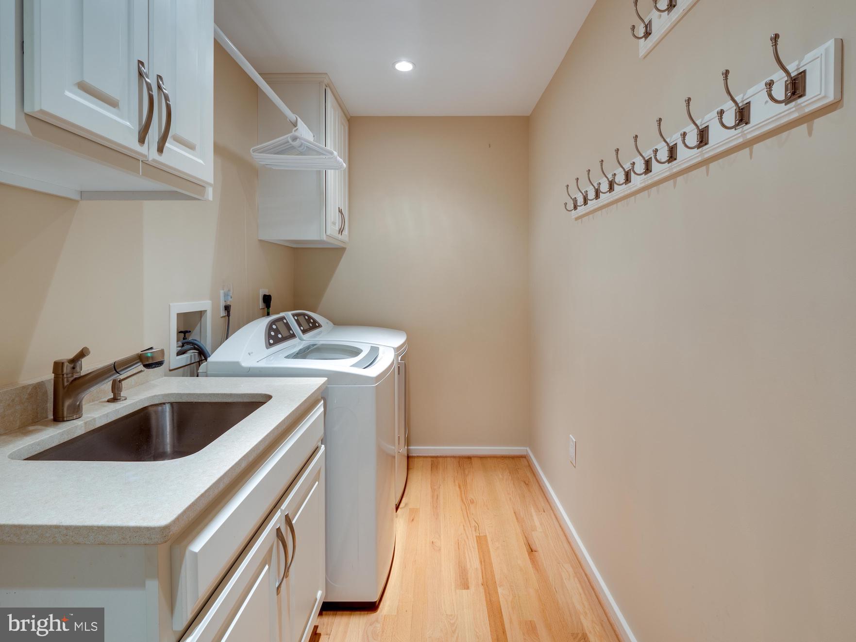1407 Belcastle Court Reston, VA 20194 - Photo 33 of 42 Main level Laundry Room includes deep sink