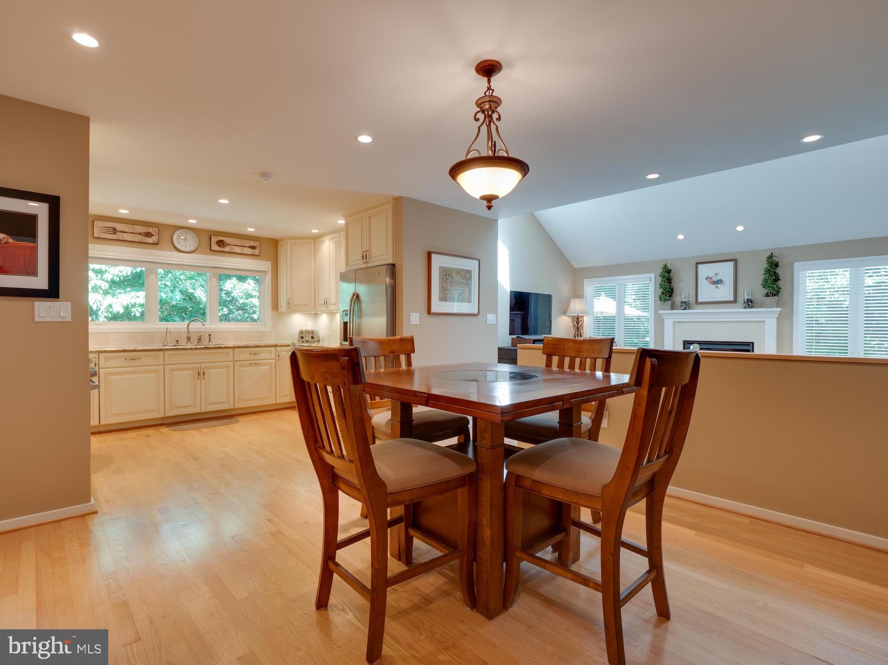 1407 Belcastle Court Reston, VA 20194 - Photo 6 of 42 Kitchen eating area opens to Family Room