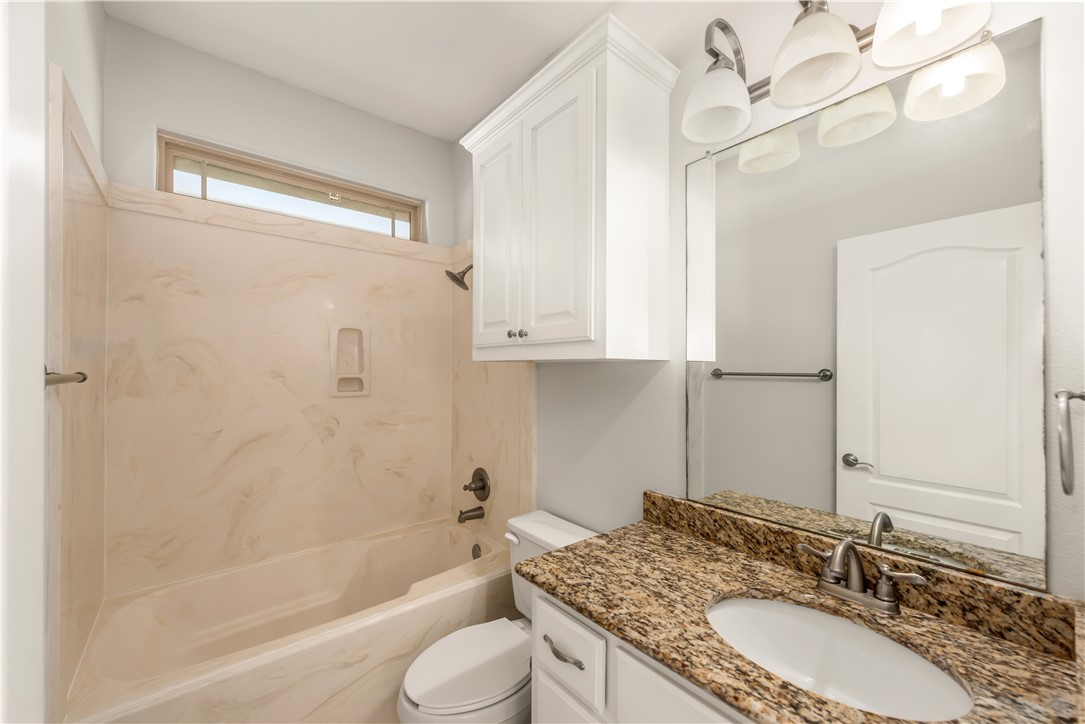 3916 Incourt Lane College Station, TX 77845 - Photo 9 of 15 Full bath with toilet, shower / bathtub combination, and vanity