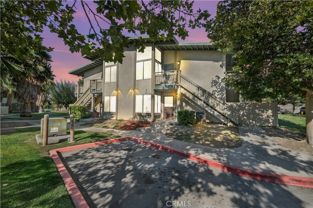 1800 East Old Ranch Road, Unit 136 Colton, CA 92324 - Photo 1 of 1 a view of a house with a yard