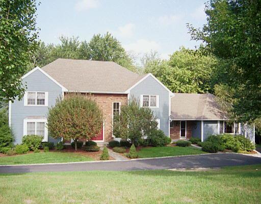 32 Crosswicks Ridge Road Wilton, CT 06897 - Photo 1 of 1 a front view of a house with a yard and garage