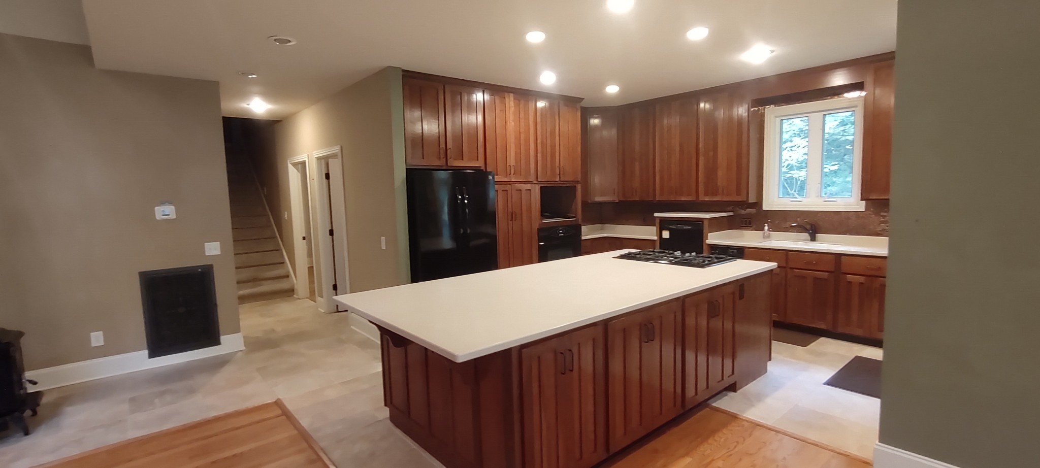 786 Old Sewanee Road Sewanee, TN 37375 - Photo 7 of 25 a kitchen with kitchen island a sink stove and refrigerator
