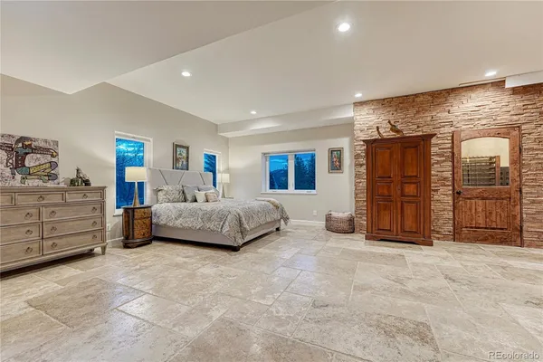 a view of a livingroom with furniture and a flat screen tv