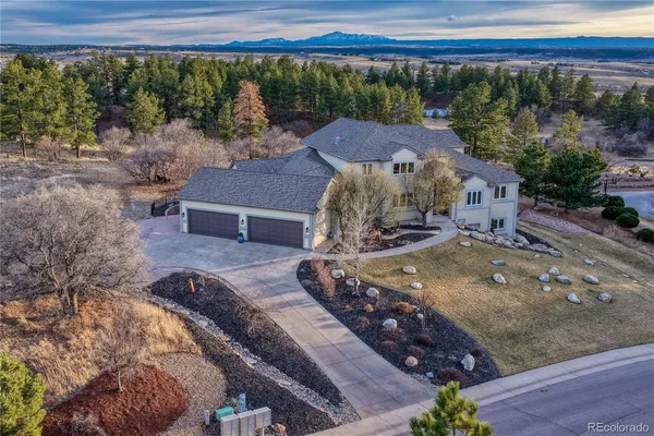 an aerial view of residential house with outdoor space