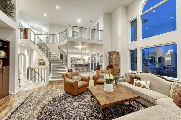 a living room with furniture and a table