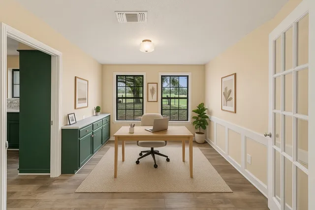 a workspace with furniture and window