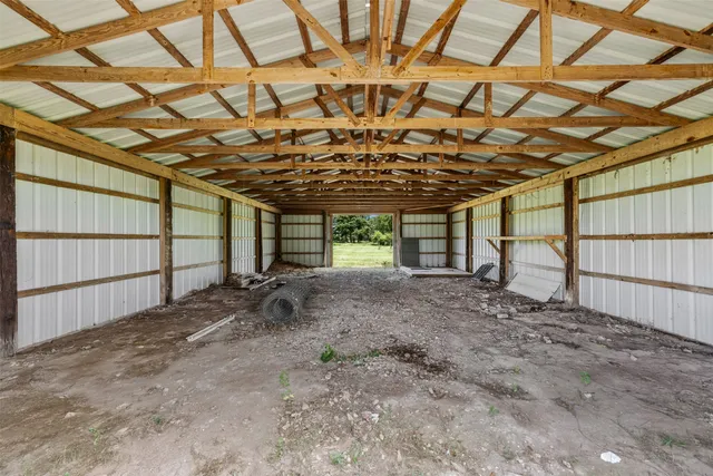 a view of a room with wooden walls