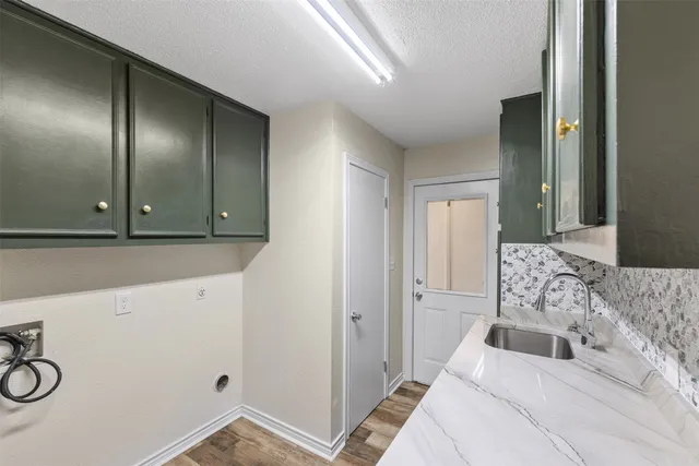 a bedroom with a large bed and a mirror