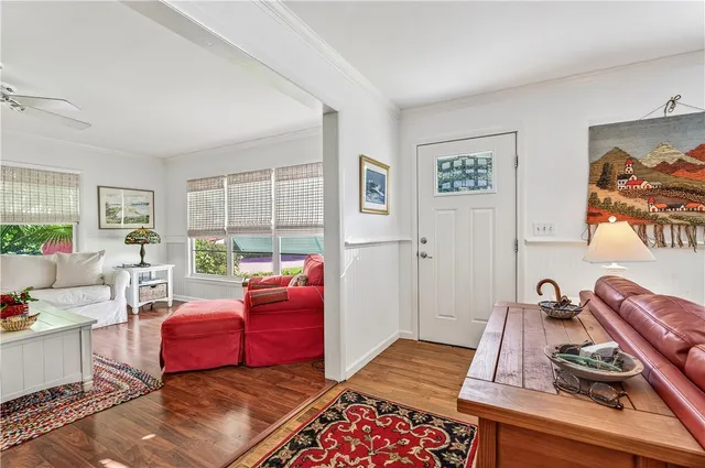 a living room with furniture and a table